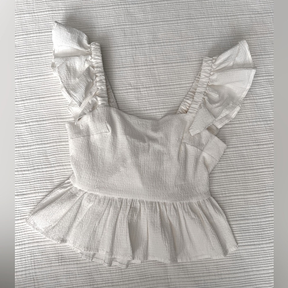 NWOT Francesca Open Back Bow Blouse